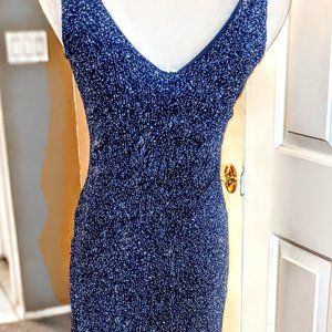 Elegant blue/silver glittery evening gown with fringes.